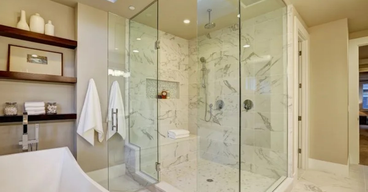 Installed shower surround with clean wall panels and fixtures